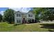 Traditional home with well-manicured lawn and mature shade trees at 8436 Cyprus Ridge Way, Douglasville, GA 30134
