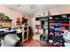 Well-organized office with extensive shelving, ideal for storage and crafts at 8436 Cyprus Ridge Way, Douglasville, GA 30134
