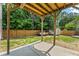 Patio view of backyard featuring a privacy fence at 8436 Cyprus Ridge Way, Douglasville, GA 30134