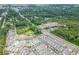 Aerial view of a modern suburban community near Suwanee Town Center, showcasing the neighborhood layout and surroundings at 1023 Harvest Park Ln, Suwanee, GA 30024