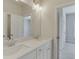 Bathroom featuring double sinks and large mirrors at 1023 Harvest Park Ln, Suwanee, GA 30024