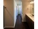 Modern bathroom with double sinks and wood-look flooring at 1151 Park Center Cir, Austell, GA 30168