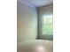 Well-lit room featuring a large window and ample space for comfortable living at 1151 Park Center Cir, Austell, GA 30168