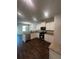 Open kitchen with granite countertops and stainless steel appliances at 1151 Park Center Cir, Austell, GA 30168