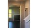 View of the living room with a fireplace and adjacent doorway at 1151 Park Center Cir, Austell, GA 30168
