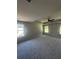 Spacious main bedroom with tray ceilings, a fan, and lots of natural light at 1151 Park Center Cir, Austell, GA 30168