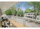 Relaxing balcony with seating and views of the surrounding trees and neighborhood at 1990 Wellbourne Drive Northeast #7 Ne Dr # 7, Atlanta, GA 30324