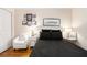 Charming bedroom with hardwood floors, stylish decor, and comfortable furnishings at 1990 Wellbourne Drive Northeast #7 Ne Dr # 7, Atlanta, GA 30324