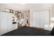 Bedroom features hardwood floors, white closet and desk with chair, and various wall art at 1990 Wellbourne Drive Northeast #7 Ne Dr # 7, Atlanta, GA 30324