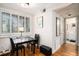 Bright breakfast nook with natural light and a view to the updated bathroom at 1990 Wellbourne Drive Northeast #7 Ne Dr # 7, Atlanta, GA 30324