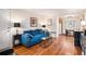 Cozy living room with hardwood floors, a comfortable blue sofa, and plenty of natural light at 1990 Wellbourne Drive Northeast #7 Ne Dr # 7, Atlanta, GA 30324