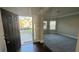 Inviting home entrance with hardwood floors, arched doorway, and view of front yard at 265 Sanctuary Dr, Lawrenceville, GA 30046