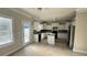 Updated kitchen features stainless steel appliances, granite counters, island, and eat-in area at 265 Sanctuary Dr, Lawrenceville, GA 30046