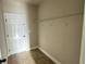 Mud room with wire shelving and an exterior door at 265 Sanctuary Dr, Lawrenceville, GA 30046