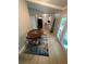 Dining area features hardwood floors, decorative rug, and an adjacent kitchen view at 2661 Throatlatch Sw Ln, Marietta, GA 30064