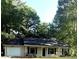 Charming single-story home with a garage and beautiful landscaping at 2661 Throatlatch Sw Ln, Marietta, GA 30064