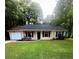 Charming ranch style home with a well-maintained front yard and inviting entrance at 2661 Throatlatch Sw Ln, Marietta, GA 30064