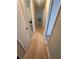 Hallway featuring luxury vinyl plank flooring and white trim at 2661 Throatlatch Sw Ln, Marietta, GA 30064