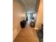 Hallway view showcasing hardwood floors leading to an open floor plan at 2661 Throatlatch Sw Ln, Marietta, GA 30064