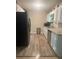 Well-lit kitchen featuring stainless steel appliances and plenty of counter space at 2661 Throatlatch Sw Ln, Marietta, GA 30064