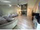 Spacious living room featuring a stone fireplace and light-colored wood floors at 2661 Throatlatch Sw Ln, Marietta, GA 30064