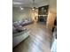 Open living area with vaulted ceilings and light wood flooring at 2661 Throatlatch Sw Ln, Marietta, GA 30064