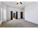 Bedroom featuring crown molding, carpet, ceiling fan, and exits to other rooms at 2765 Prado Ln, Marietta, GA 30066