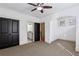 Bedroom with large windows, plush carpet, and closet space at 2765 Prado Ln, Marietta, GA 30066