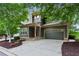 Charming two-story home with a well-manicured lawn and a two-car garage in a leafy neighborhood at 2765 Prado Ln, Marietta, GA 30066