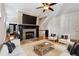 Living room with fireplace and hardwood floors with staircase leading upstairs at 2765 Prado Ln, Marietta, GA 30066
