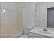 Bathroom featuring a single sink vanity and shower with bathtub at 5090 Leeshire Trce, Tucker, GA 30084