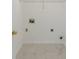 Convenient laundry room area with a sleek marble floor at 5090 Leeshire Trce, Tucker, GA 30084