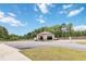 A standalone amenity center sits near ample parking, offering a convenient area for residents to gather at 6315 Princeton Ridge Dr, Lithonia, GA 30058