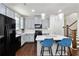 Modern kitchen with gray cabinets, stainless steel appliances, and a bright white island with seating at 6315 Princeton Ridge Dr, Lithonia, GA 30058