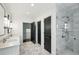 Spacious bathroom featuring double sinks, a glass shower, and modern fixtures at 444 Rock Springs Ne Rd, Atlanta, GA 30324
