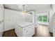 Luxury closet features custom shelving, storage, and a center island at 444 Rock Springs Ne Rd, Atlanta, GA 30324