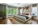 Spacious main bedroom boasts hardwood floors, large windows, and neutral tones at 444 Rock Springs Ne Rd, Atlanta, GA 30324