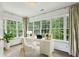 Bright home office features lots of natural light with a desk and chair at 444 Rock Springs Ne Rd, Atlanta, GA 30324