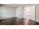 Light-filled bedroom features hardwood floors and closet space at 4935 Golden Sw Cir, Mableton, GA 30126