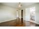 Bright bedroom with hardwood floors, ensuite bathroom, and neutral paint at 4935 Golden Sw Cir, Mableton, GA 30126