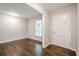 Spacious living room with hardwood flooring, neutral walls and a window at 4935 Golden Sw Cir, Mableton, GA 30126