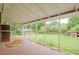 Spacious screened porch with a lovely backyard view at 4935 Golden Sw Cir, Mableton, GA 30126