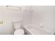 Bathroom featuring a bathtub and toilet at 502 Brighton Pt, Atlanta, GA 30328