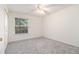 Comfortable bedroom featuring neutral carpet and natural light at 502 Brighton Pt, Atlanta, GA 30328