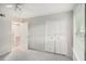 This bedroom features plush carpet, double-door closet and bright window at 502 Brighton Pt, Atlanta, GA 30328