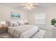 Cozy bedroom with a large bed, soft rug, and bright window at 502 Brighton Pt, Atlanta, GA 30328
