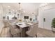 Bright dining area open to the living room showcases a white table and chairs at 502 Brighton Pt, Atlanta, GA 30328