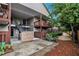 Apartment building with private balconies, stone accents, and landscaped grounds at 502 Brighton Pt, Atlanta, GA 30328