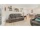 Spacious living room with light-colored floors and open layout to the kitchen at 502 Brighton Pt, Atlanta, GA 30328