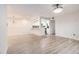 Spacious open floor plan featuring laminate flooring and access to a kitchen at 502 Brighton Pt, Atlanta, GA 30328